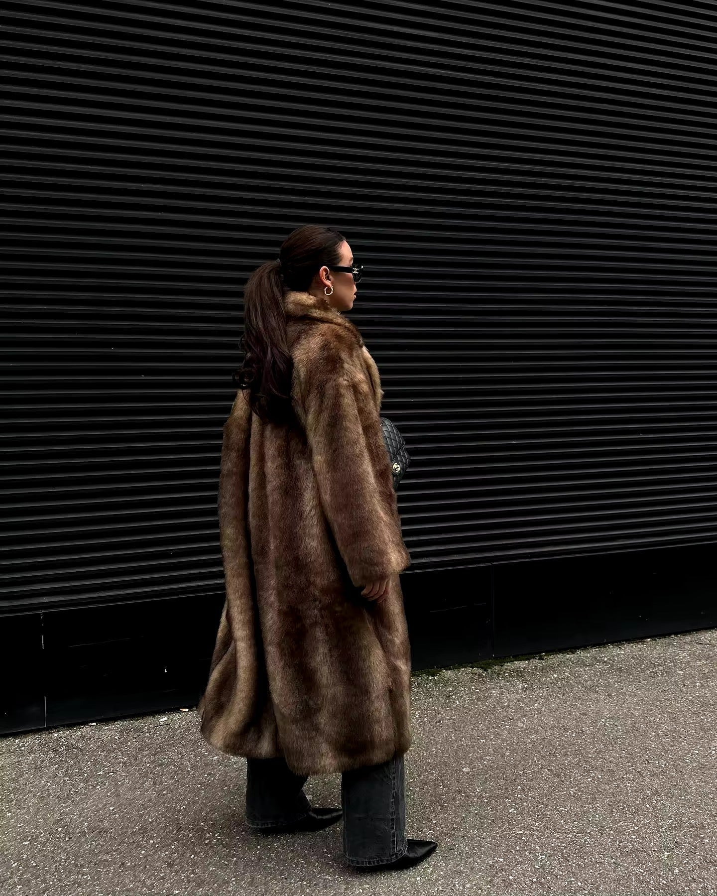 Luxe warme dames winterjas met lange elegante pasvorm