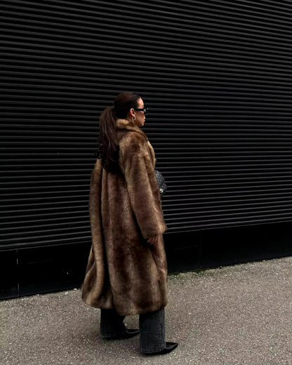 Luxe warme dames winterjas met lange elegante pasvorm