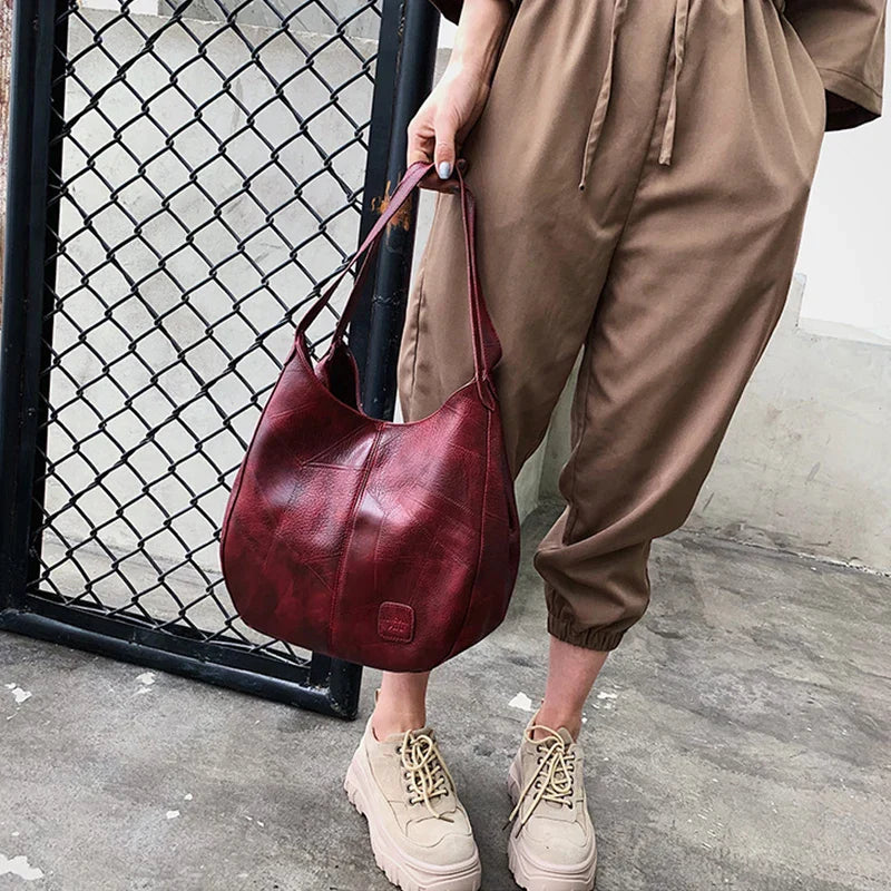 Sac bandoulière hobo spacieux pour femme, aspect cuir, avec trousse assortie 