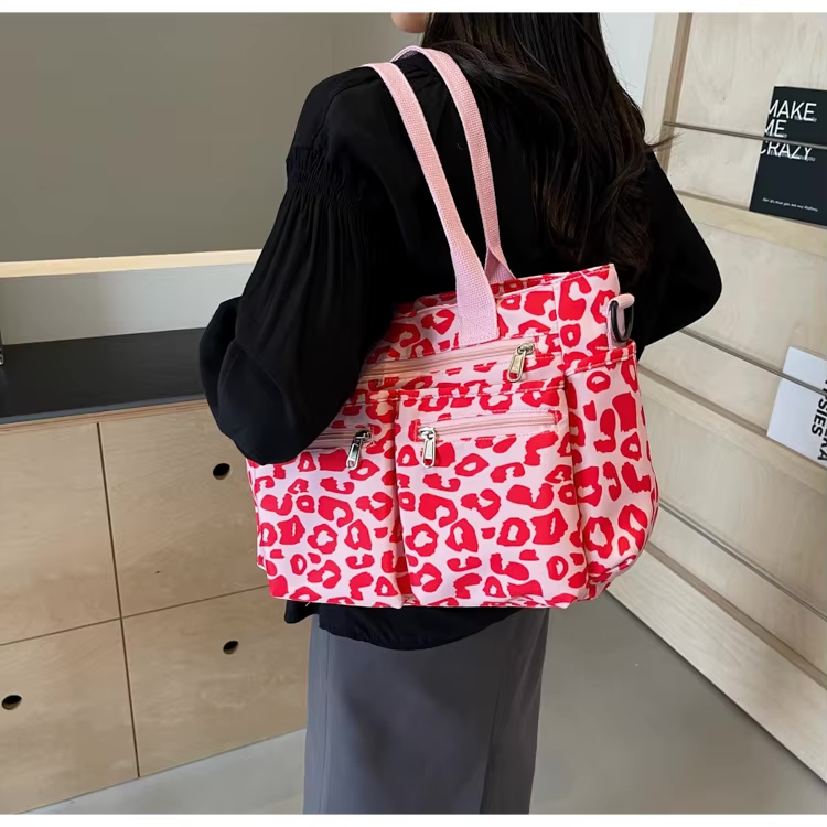 Tessi | Sac bandoulière léopard pratique avec compartiments 