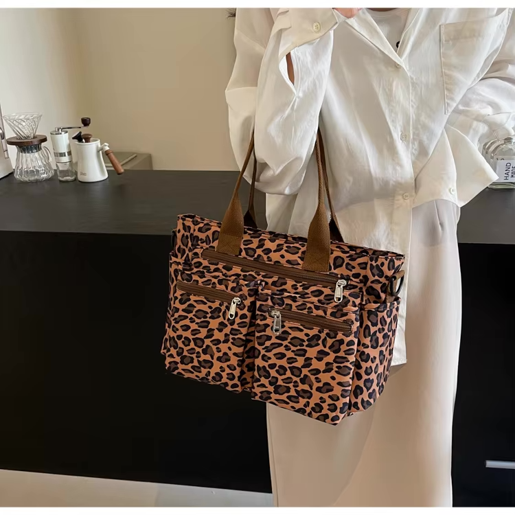 Tessi | Sac bandoulière léopard pratique avec compartiments 