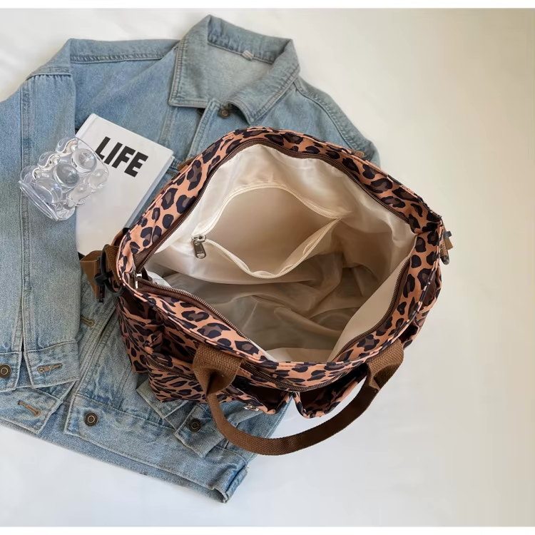 Tessi | Sac bandoulière léopard pratique avec compartiments 