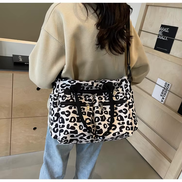 Tessi | Sac bandoulière léopard pratique avec compartiments 