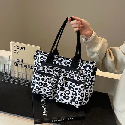 Tessi | Sac bandoulière léopard pratique avec compartiments 