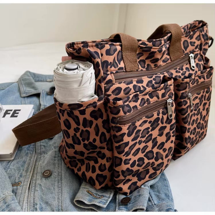 Tessi | Sac bandoulière léopard pratique avec compartiments 