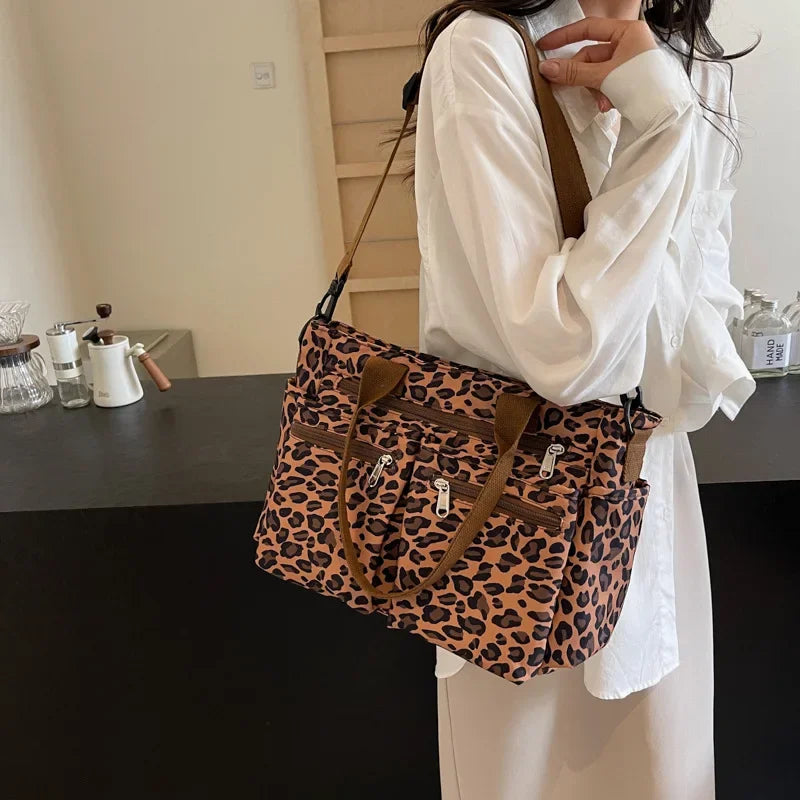 Tessi | Sac bandoulière léopard pratique avec compartiments 