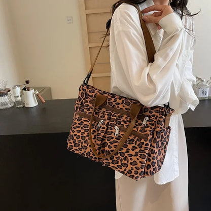 Tessi | Sac bandoulière léopard pratique avec compartiments 