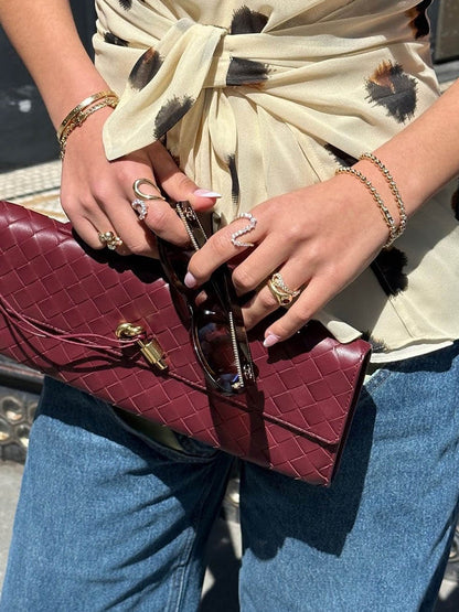 Sac à main pour femme avec motif tissé et fermoir doré