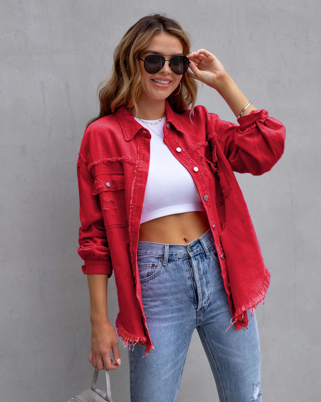 Denim dames jas met luchtige oversized pasvorm en rafelafwerking