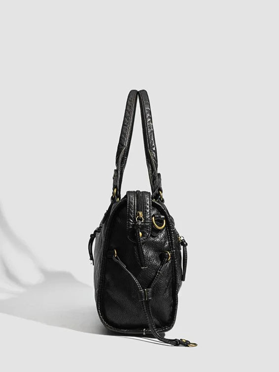 Sac à main noir de luxe pour femme avec fermeture éclair et finitions dorées