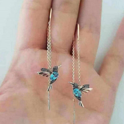 Boucles d'oreilles ornées d'émail et de zirconias en forme de colibri