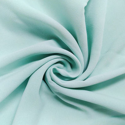 Elegante tweedelige set: top met lange mouwen en boord en broek met hoge taille