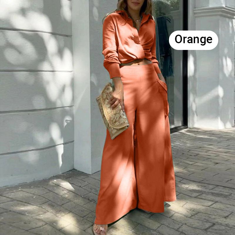 Elegante tweedelige set: top met lange mouwen en boord en broek met hoge taille