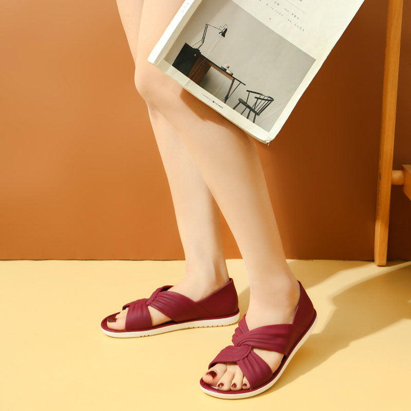 Comfortabele sandalen met een effen kleur strikje