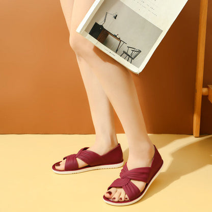 Comfortabele sandalen met een effen kleur strikje