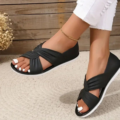Comfortabele sandalen met een effen kleur strikje