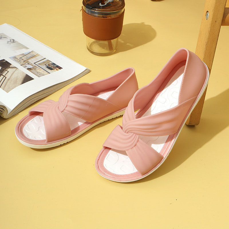 Comfortabele sandalen met een effen kleur strikje