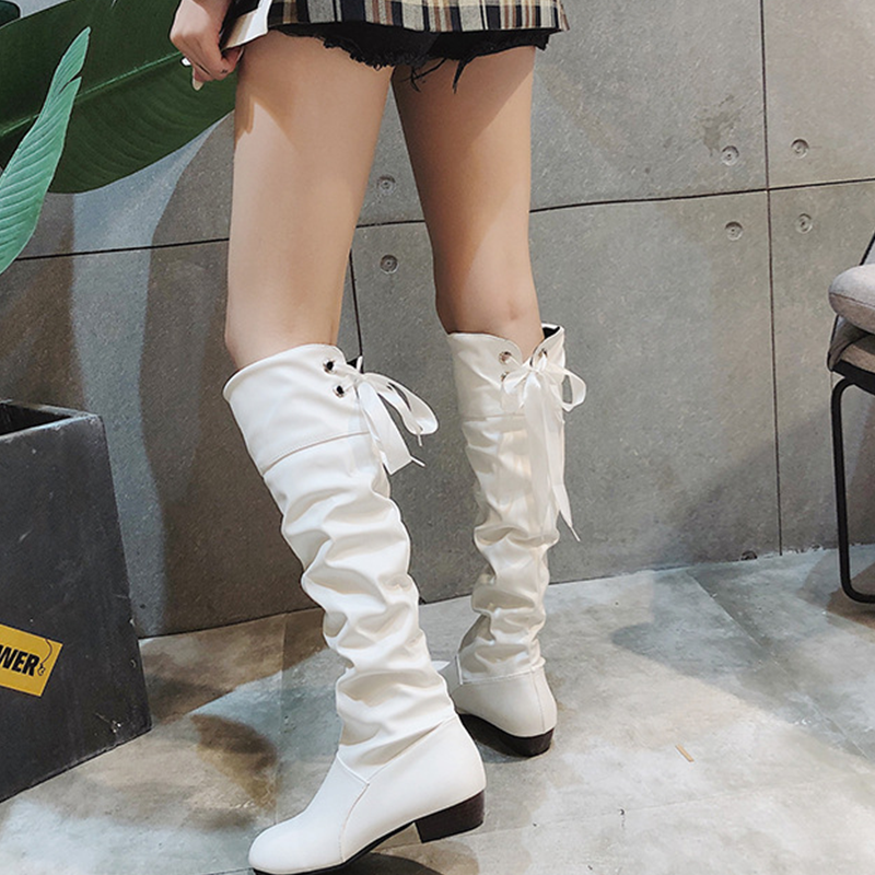 Elegante hoge laarzen met strikdetail