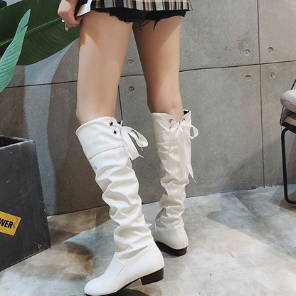 Elegante hoge laarzen met strikdetail